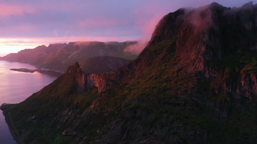 Sunset over Fjord and Mountain on Senja Island in Norway, aerial view from drone | Shutterstock HD Video #1105426835