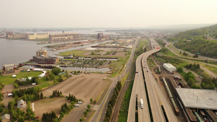 Aerial view of a port city on Lake Superior. Duluth, Minnesota, United States. Cityscape, skyline. Spring Summer, sunset