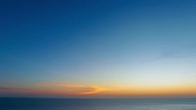 
Aerial hyper lapse view beautiful blue sky above the ocean.
Scene of colorful blue rays glistened at sunset.
creating a beautiful and calming sight.
Gradient color. abstract nature background
