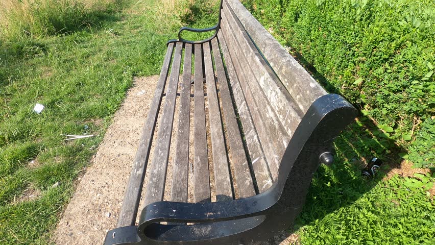 Close up footage of bench in park