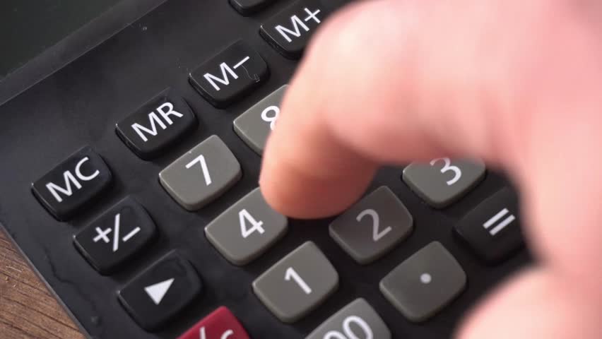 Calculating Taxes With Money And Calculator  Royalty-Free Stock Footage #1105435953