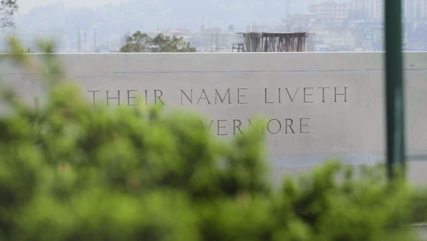 A message is engraved on the stone in memory of the fallen or dead soldiers or martyrs in the second world war in a war memorial or cemetery, Kohima, Nagaland