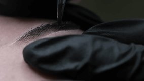 close-up video reveals the precision of the microblading needle, delicately crafting each hair stroke. Witness the transformation of sparse brows into fuller. microblading or eyebrow tattooing