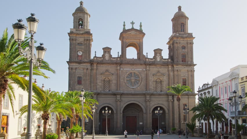 Cathedral de Santa Ana de Canarias on Gran Canaria island, Spain. Historic cathedral on the Saint Ana square in Las Palmas. Canary islands travel destintaion. Steadicam revealing shot