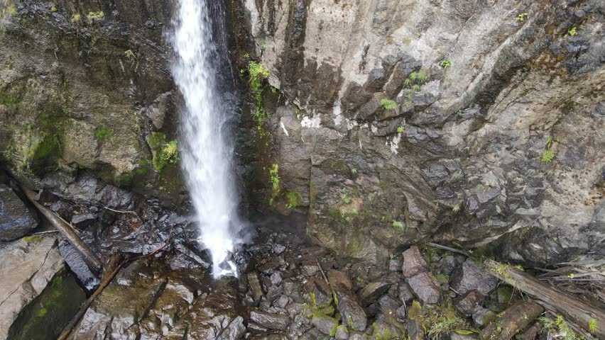 Aerial shot of the lush forest and Drift Creek Falls in Oregon, USA. Drift Creek Falls is interesting because if has a 240 foot long suspension bridge over the falls.