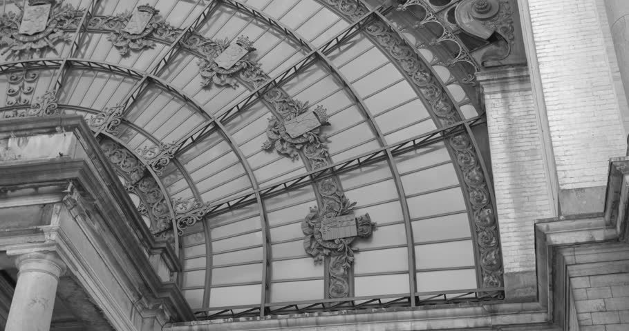 Glass Exterior Of The Royal Museum of the Armed Forces and Military History Within Cinquantenaire Park In Brussels, Belgium. Low Angle