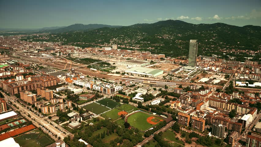 Aerial view of Torino Lingotto Railway Station within the cityscape of Turin, Italy