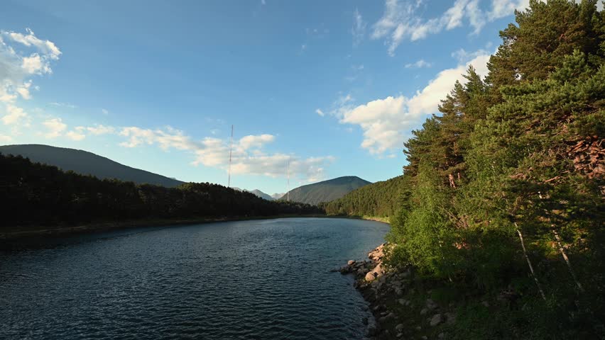 Views of Engolasters Lake in Andorra over the Pyrenees.