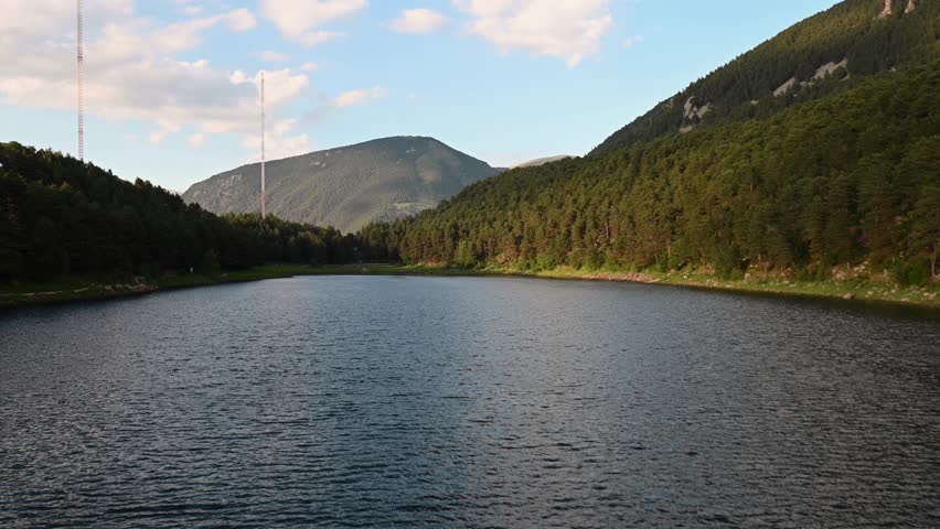Views of Engolasters Lake in Andorra over the Pyrenees.