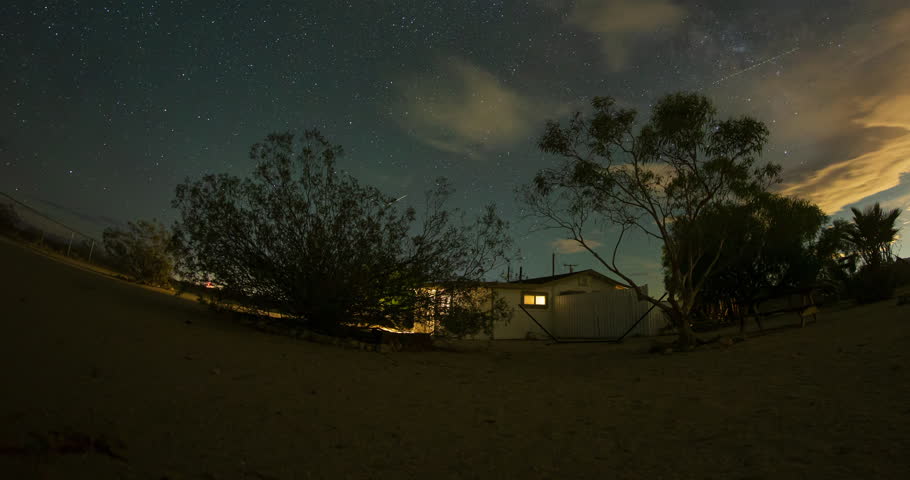 Surreal Stars Night Sky Clouds Desert House Timelapse
