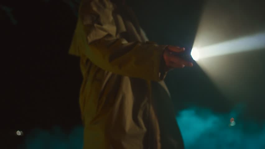 flashlight at night in the hands of a detective or a policeman police investigation or search for a missing person Royalty-Free Stock Footage #1105483599