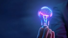 Businessman shows AI brain in glowing light bulb, Artificial intelligence, chat bot, machine learning concept, big data, cloud computing, computer network and futuristic innovation technology - Powered by Shutterstock - Get 15% off with code: PIKWIZARD15