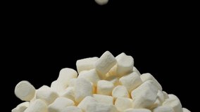 Pile of soft marshmallows falling. Sweet marshmallow falls from top to bottom. - Powered by Shutterstock - Get 15% off with code: PIKWIZARD15