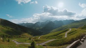 Experience the stunning Col d'Allos. This captivating video showcases breathtaking views and winding roads of this iconic mountain pass. Thrilling and beautiful alpine landscape.