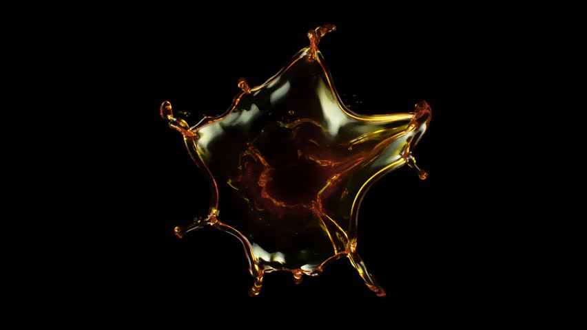 Super Slow Motion Shot of Real Oil Splash Isolated on Black Background at 1000fps.