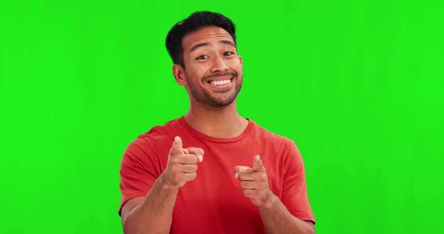 Green screen, yes and man face with hand pointing in studio for you, approval or vote on mockup background. Finger, agreement and portrait of happy asian male person with gesture, emoji or expression | Shutterstock HD Video #1105501047