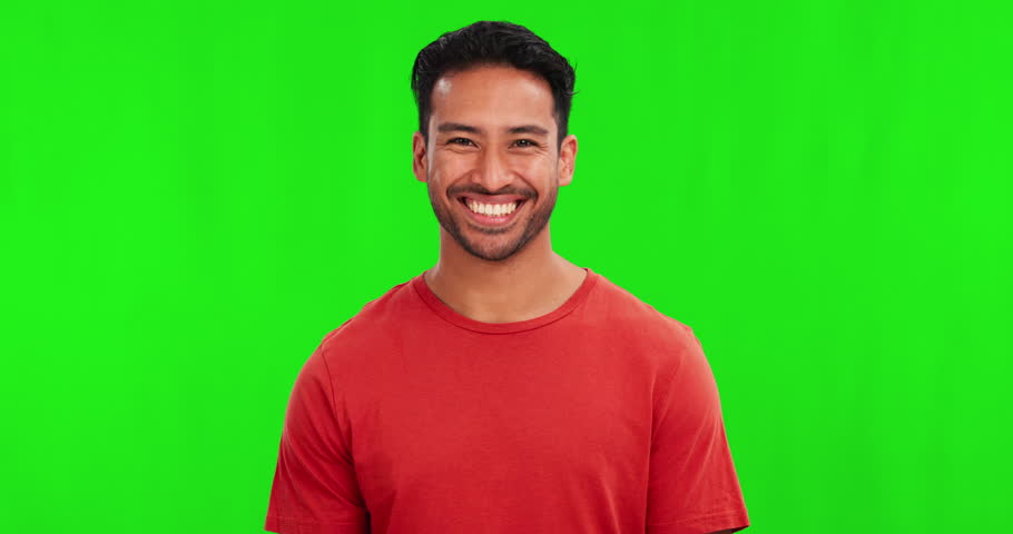 Happy, portrait of a man and laugh against a green screen for fun comedy. Happiness on face, mockup space or smile of young male person on a studio or chroma key background for funny joke or meme