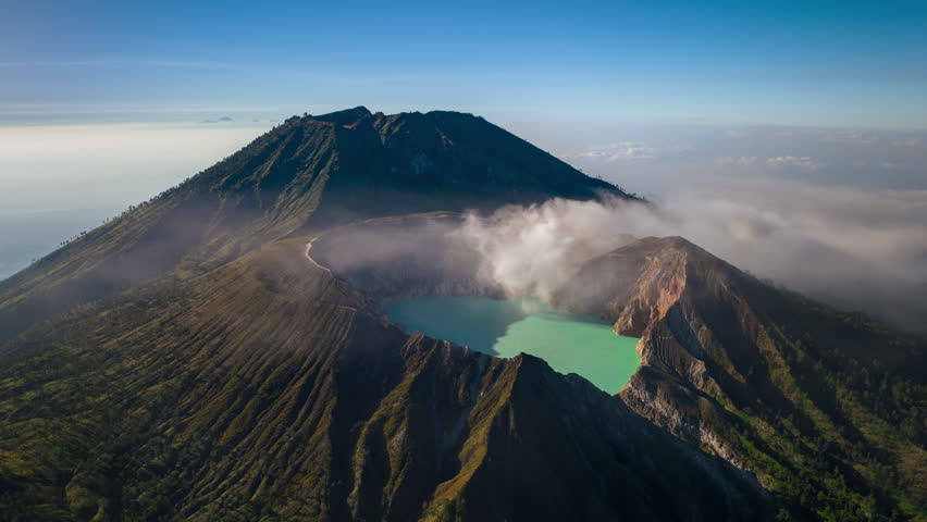 Aerial view flying to mount Kawah Ijen crater, Sulfur mining in an active volcano, Java, Indonesia 
 Royalty-Free Stock Footage #1105504677