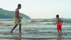 Dad playing and fooling around with his toddler son at the beach having fun. Multi ethnic father playing with his young son at the beach, priceless parenthood moments.
 - Powered by Shutterstock - Get 15% off with code: PIKWIZARD15