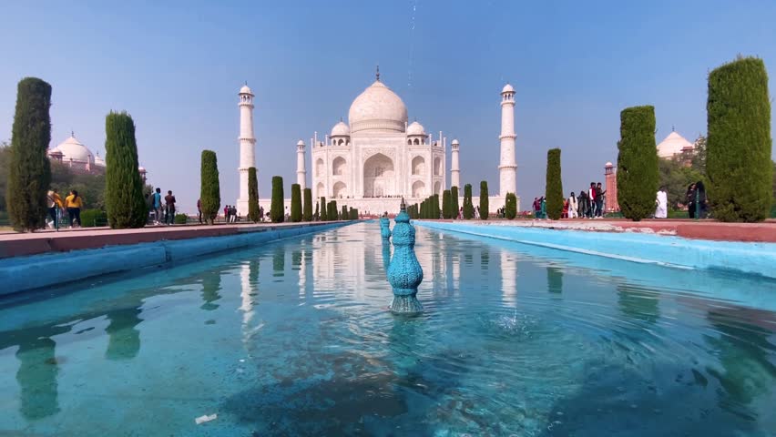 Agra, Uttar Pradesh, India - 12.15.2022: Taj Mahal, Agra, India. Tourists visiting a popular tourist attraction. Royalty-Free Stock Footage #1105508347