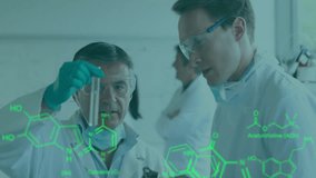 Animation of chemical structures against two diverse male scientists working at laboratory. Research and science technology concept - Powered by Shutterstock - Get 15% off with code: PIKWIZARD15