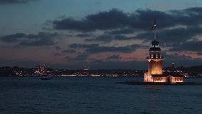 Istanbul background 4k video. Kiz Kulesi or Maiden's Tower in the evening with motion of the clouds.