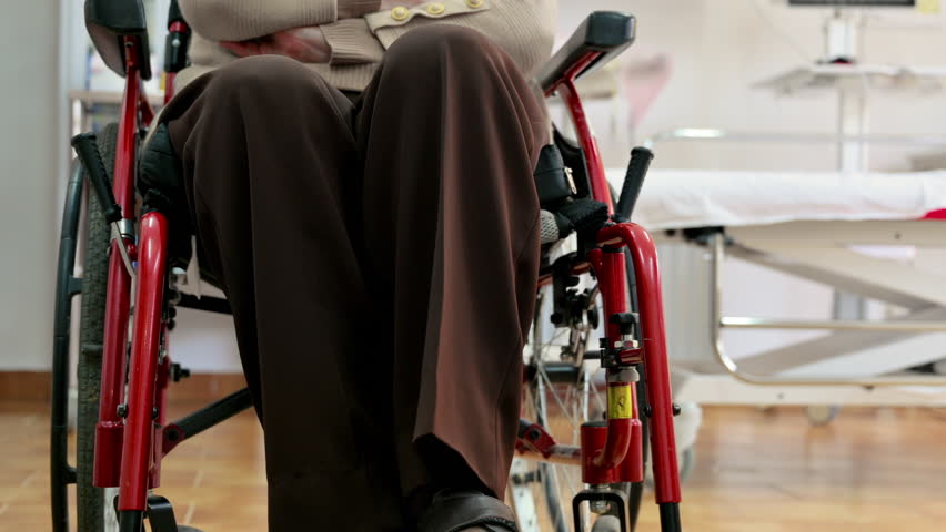 Senior woman patient on wheelchair at hospital or doctor office, unrecognizable elder woman. High quality 4k footage. | Shutterstock HD Video #1105514463