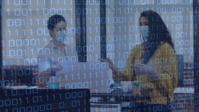Animation of looping binary codes over diverse coworkers wearing mask discussing reports. Digital composite, multiple exposure, coronavirus, business, teamwork, coding and technology concept. - Powered by Shutterstock - Get 15% off with code: PIKWIZARD15