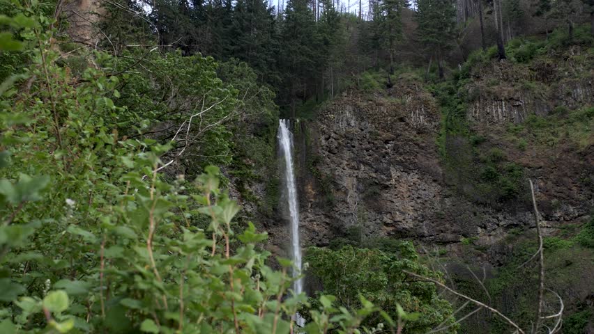 Cinematic slow motion of Multnomah Falls waterfall in Oregon.