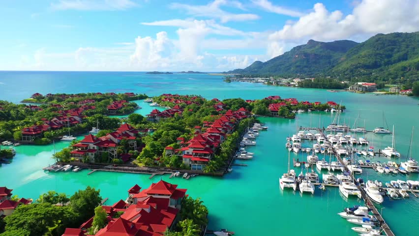 Seychelles. Mahe, Eden marina. Drone aerial view of Eden marina Seychelles bird eye view of tropical Island. View from above. The best marina of Seychelles. Royalty-Free Stock Footage #1105534451