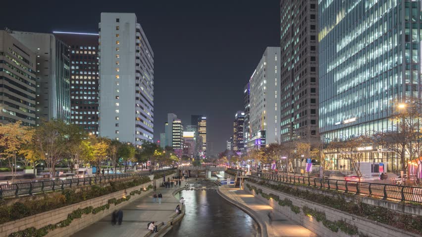Seoul South Korea time lapse 4K, city skyline night timelapse at Cheonggyecheon Stream