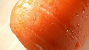 It reveals the captivating interplay between the carrot's texture and the water droplets. The carrot's skin appears slightly rough and uneven, with subtle lines and crevices. Vegetable concept. 4K
 - Powered by Shutterstock - Get 15% off with code: PIKWIZARD15