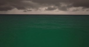 Storm clouds and rain over sea, Dark storm clouds passing video,High quality footage clouds over sea and waves background