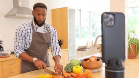 Afro American Chef Food Blogger In Apron Records Online Video Culinary Webinar In Home Kitchen