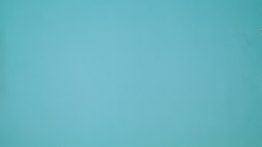 6k Purple vintage book appear and open on dark blue background. Flat lay. Stop motion 