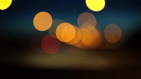 Blurred lights evening city traffic bokeh. Defocused night city traffic. Blurred lights bokeh car headlights driving evening city road. City night traffic background - Powered by Shutterstock - Get 15% off with code: PIKWIZARD15