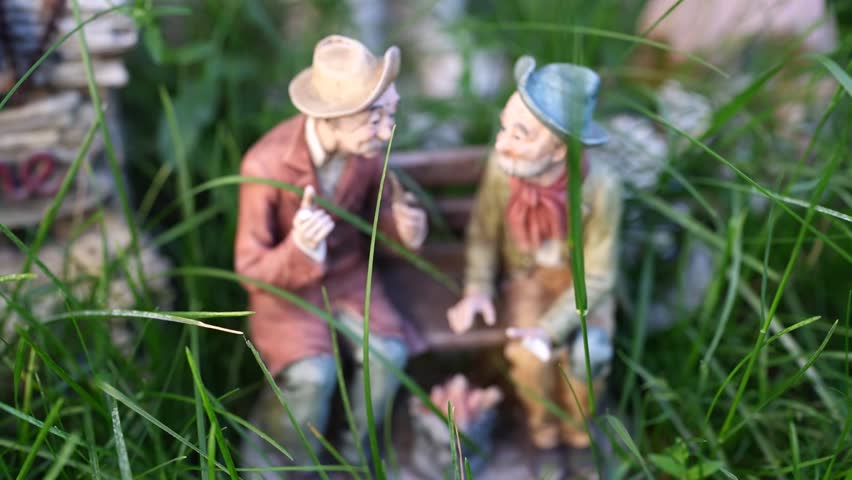  floral garden crafts , mini statues of old men having conversation, smoking  and keep warm
