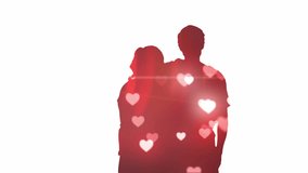 Animation of hearts falling over silhouette of couple embracing. Love, romance and lifestyle concept digitally generated video.