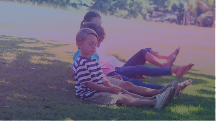 Animation of jigsaw puzzle over diverse children lying on green filed and raising legs towards head. Digital composite, multiple exposure, childhood, togetherness, playing and autism concept. | Shutterstock HD Video #1105563079