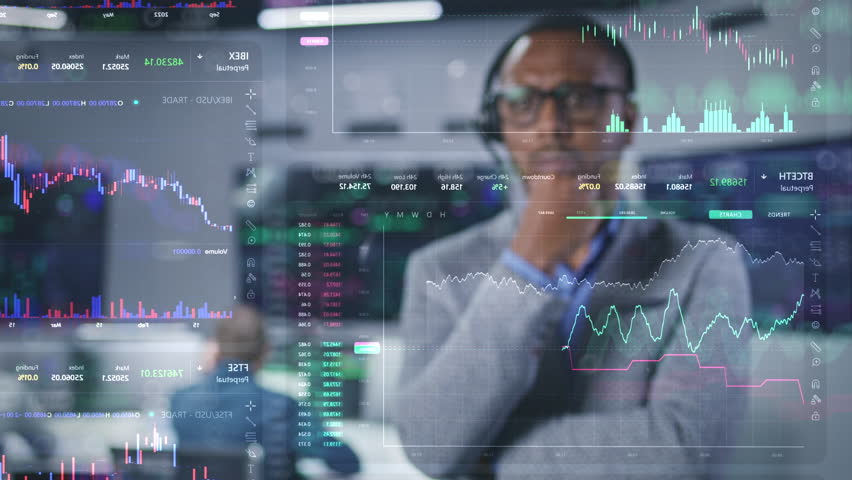 African American trader, businessman works in modern broker agency office. 3D real-time stocks and cryptocurrency charts on glass wall. VFX animation. Computers and big digital screens on background. Royalty-Free Stock Footage #1105566463