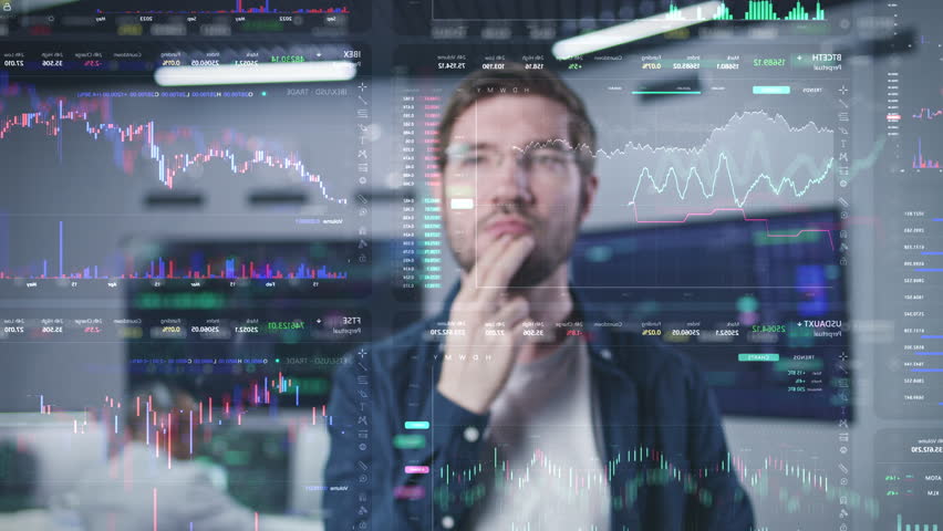 Male trader, businessman watches real-time stocks in modern office. 3D render of virtual cryptocurrency charts and graphs on glass wall. VFX animation. Computers and big digital screens on background. Royalty-Free Stock Footage #1105569705