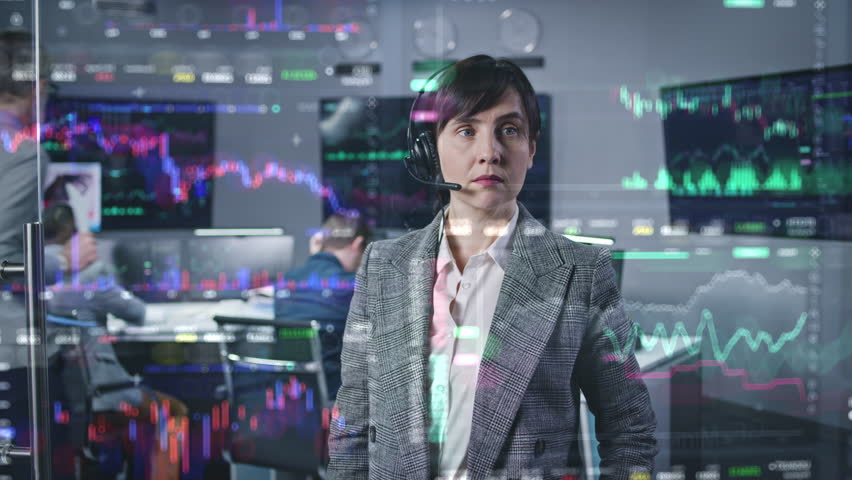 Female stock trader, businesswoman works in broker agency office. 3D abstract AI animation of real-time stocks and cryptocurrency charts on glass wall. Computers and big digital screens on background. Royalty-Free Stock Footage #1105569709