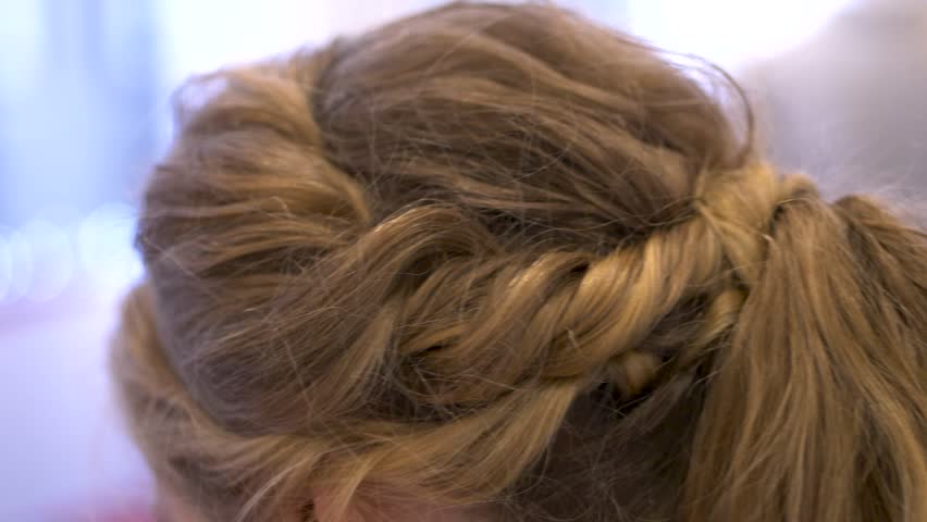 braided hair, braids in hair twisted crown braid, stylized hairstyle, blonde braided braiding closeup