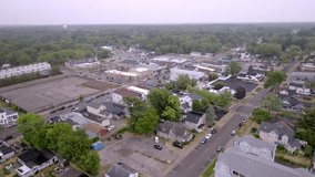Downtown New Buffalo, Michigan with drone video moving at an angle.
