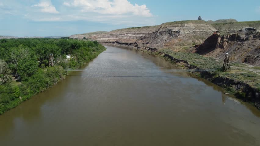Old star mine foot bridge over the Red Deer River near Rosedale, Alberta. 