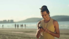 relaxed caucasian man hold use smart phone watching social media at the beach 
 - Powered by Shutterstock - Get 15% off with code: PIKWIZARD15