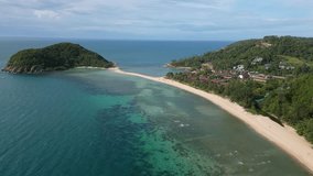 Ko Phangan, Thailand: Dramatic aerial drone video of the Haad Mae beach and island in the Koh Pha Ngan island in the gulf of Thailand in Southeast Asia. Shot with a forward motion. 