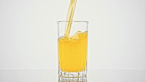 Orange Juice Pouring Into Glass - Powered by Shutterstock - Get 15% off with code: PIKWIZARD15