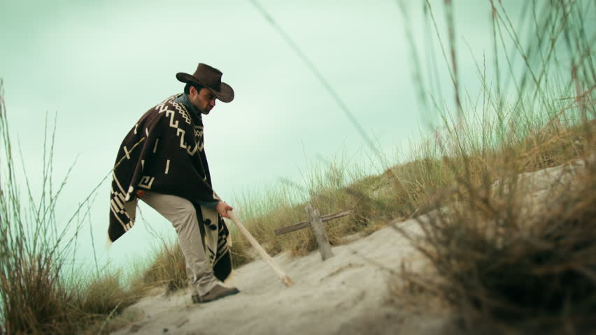 Digging a grave in the desert