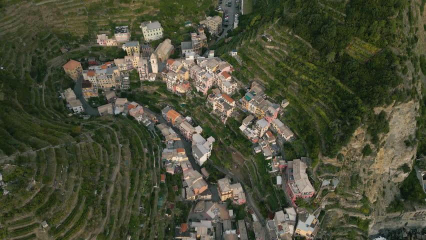 Aerial top view of Manarola Colorful cityscape on the mountains Manarola, Cinque Terre National Park, Liguria, Italy, Europe Royalty-Free Stock Footage #1105593941